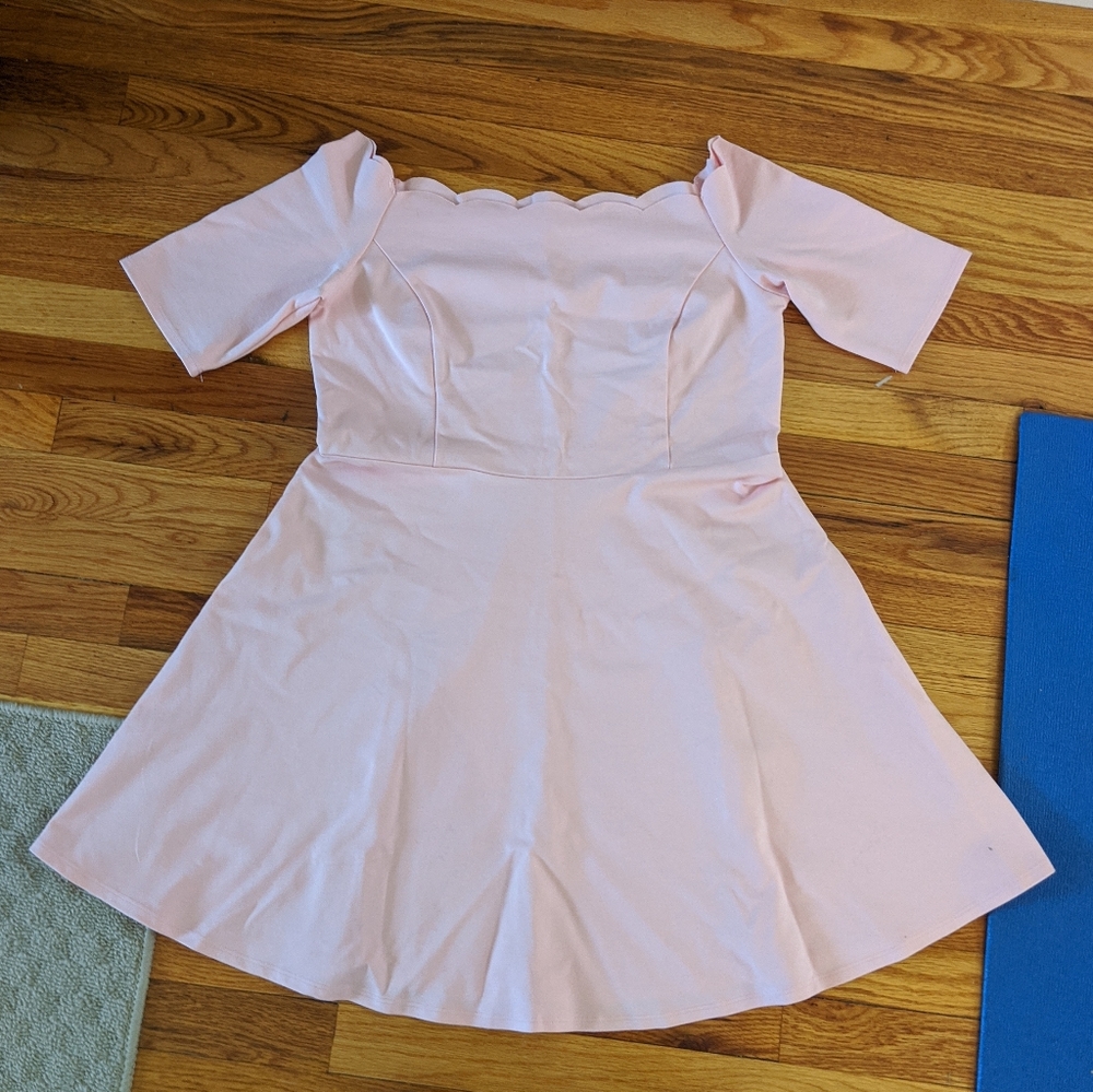 Pale pink, scalloped, off-the-shoulder dress